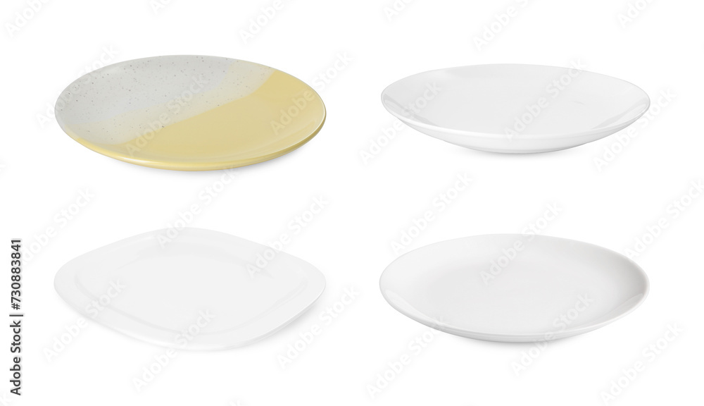 Different clean plates isolated on white, set