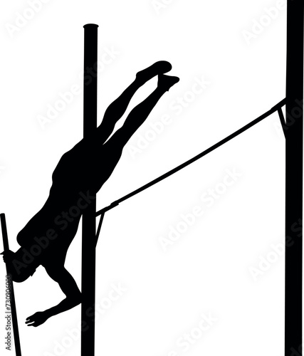 male athlete mid-air in pole vaulting event