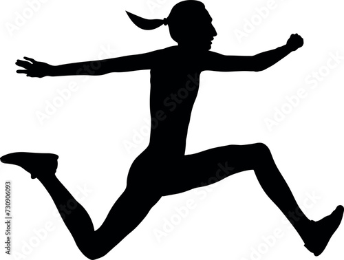 triple jump executing female athlete
