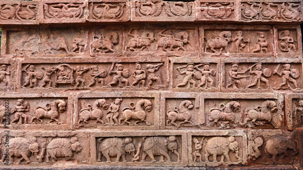 Carving Panels of Warriors, Elephants and Yali's on the Mahadeva Temple of Deobaloda, the Nagara Style Temple, built by Kalachuris in 14th Century, Raipur, Chhattisgarh, India.