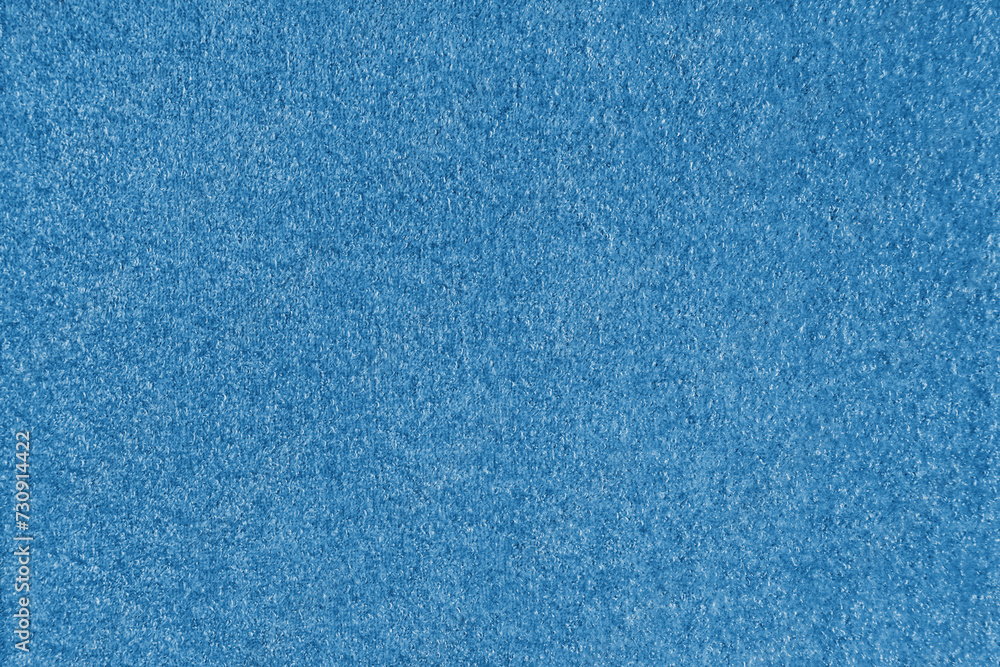 Texture background of blue fabric. Upholstery jacquard texture cloth, boucle furniture textile material, design interior, decor. Ridge fabric texture close up, backdrop, wallpaper.