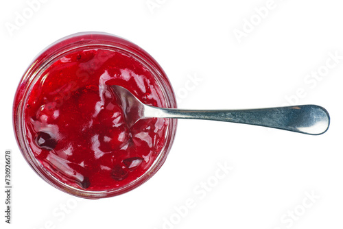 Cranberry jam in glass jare with spoon isolated on a white background .Top view photo
