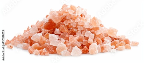A stack of pink salt on a plain white surface, a staple food ingredient used in various cuisines and recipes, adding flavor and enhancing dishes like a peach ornament on a fashion accessory.