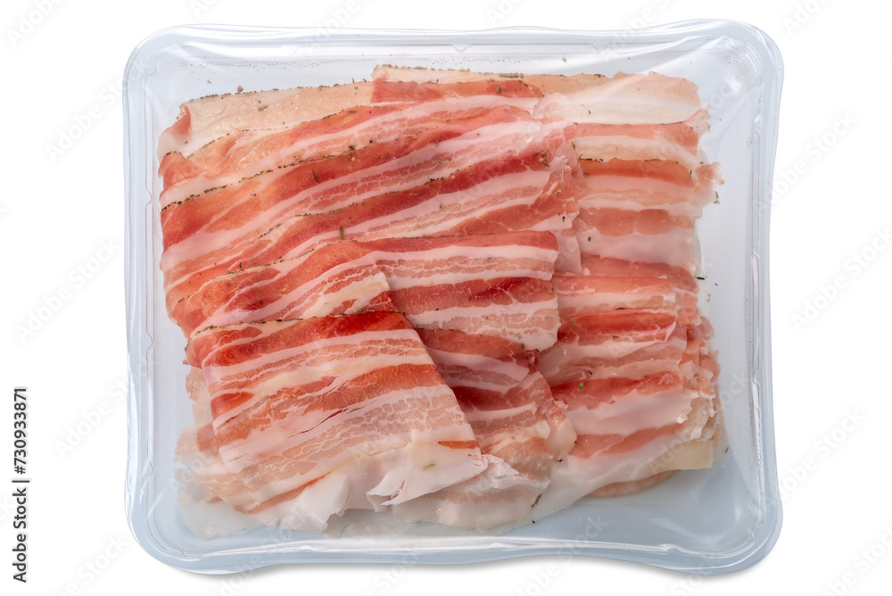 Slices of bacon lard in vacuum-packed plastic tray isolated