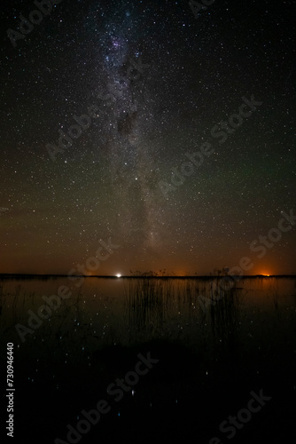 Starry sky reflected in the water, La Pampa Province, Patagonia, Argentina.