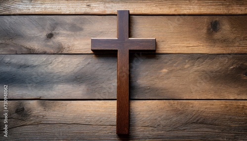 christian cross on wooden background top view with space for text religion concept