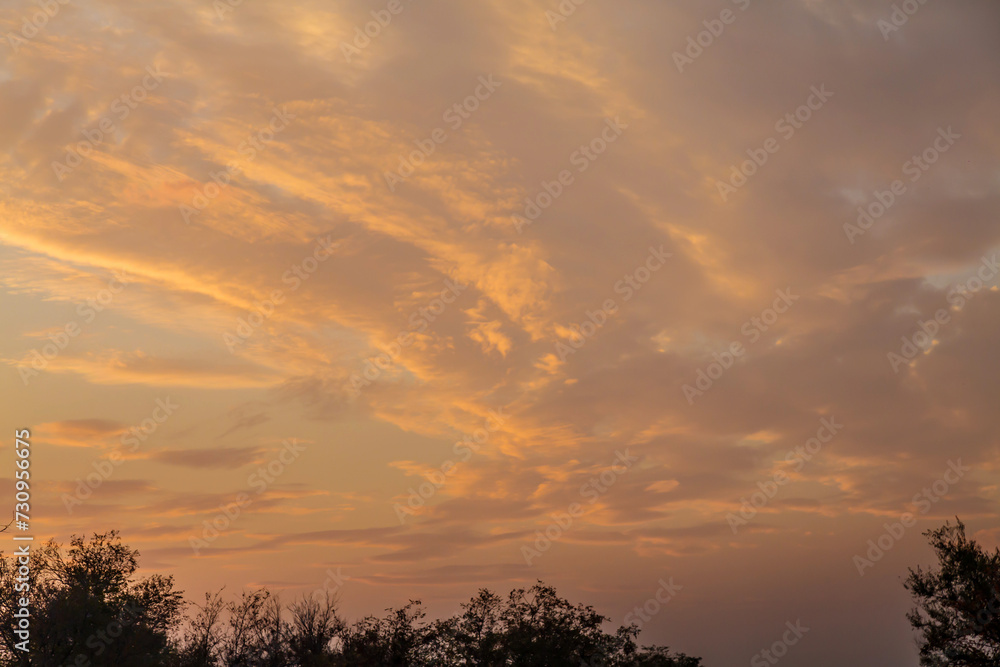 Sunset view of sunrise sunset sky with colorful clouds Sunset view of sunrise sunset sky with colorful clouds