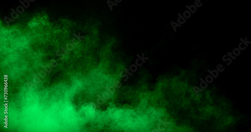 Green powder dust smoke on a black background