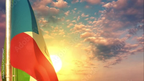 Equatorial Guinea waving flag on beautiful sundown background