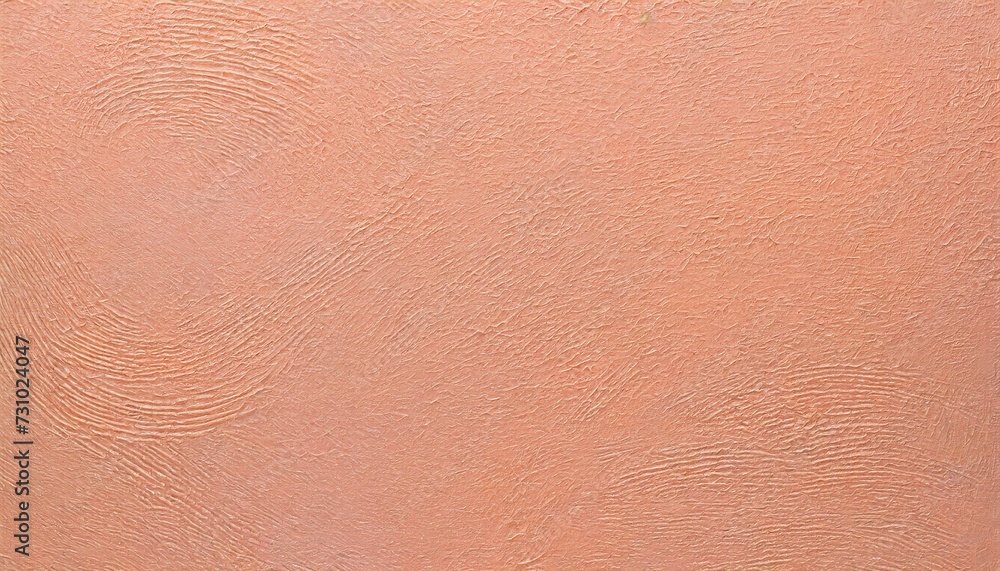 Fototapeta premium Background of embossed texture in peach fuzz color.