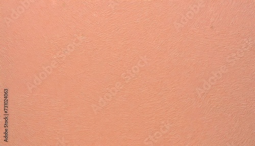 Background of embossed texture in peach fuzz color.