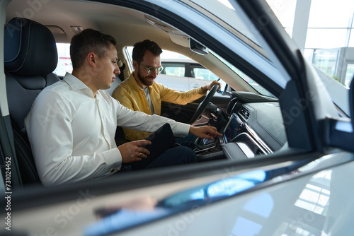 Buyer with a manager in the car