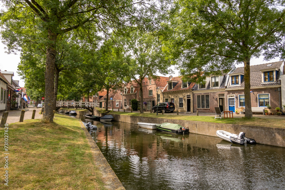 Achterom canal in old town of Medemblik, Noord-Holland, Netherlands
