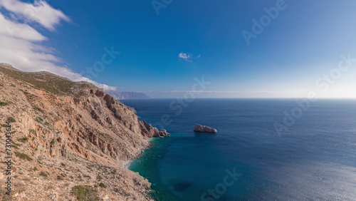The Hozoviotissa Monastery standing on a rock over the Aegean sea in Amorgos island timelapse hyperlapse, Greece.