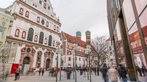 View of the St. Michael's Church and the pedestrian street of Neuhauser in centre of Munich timelapse. Germany. photo