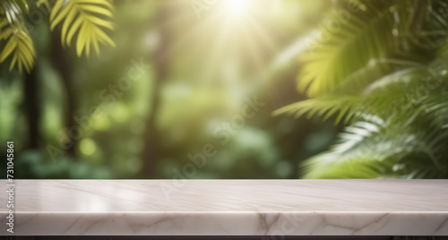 Empty marble tabletop counter on blur jungle tropical leaves. Contemporary backdrop for product presentation  podium  pedestal  blurred lush foliage. Showcase  display case. Minimal modern background.
