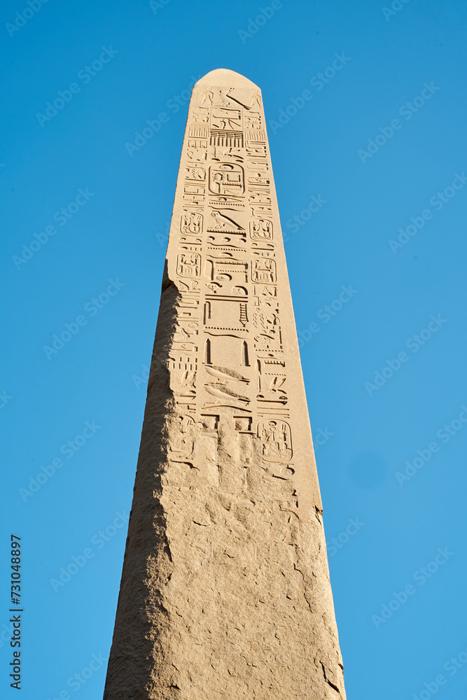 Obelisk with hieroglyphics at Karnak Temple, Luxor, Egypt. Famous ancient Karnak Temple complex, Luxor, Egypt. Ancient ruins of Karnak temple in Luxor. Egypt. 