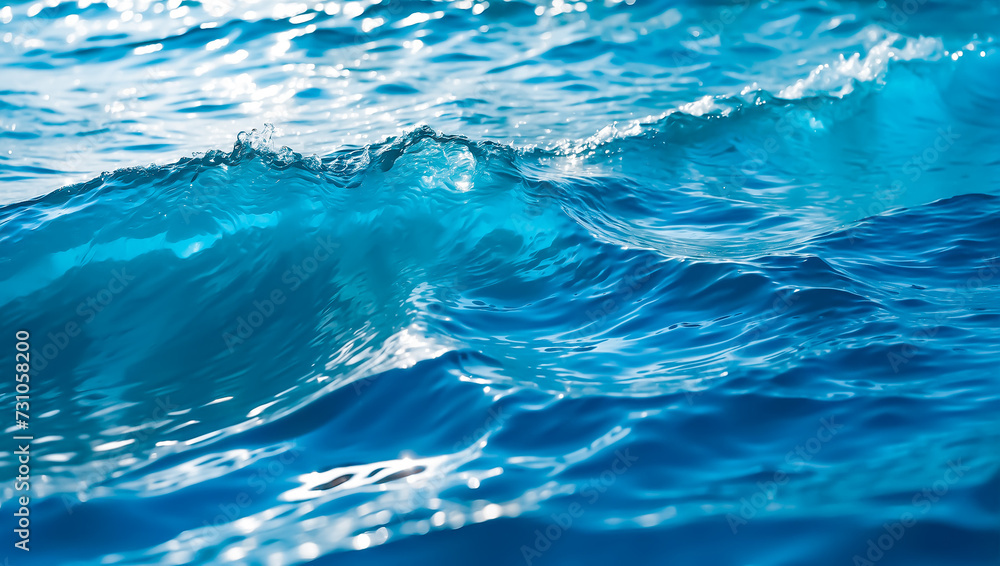 Blue wave background wallpaper, water ripples, natural drops, water splashes, beautiful realistic background of sea or ocean, nature concept.