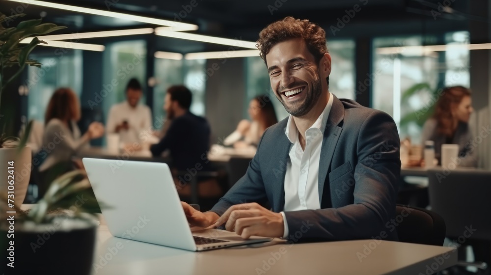 A contented businessman engages in a video call through his laptop at the office, showcasing modern work practices and digital communication. A contented businessman engages in a video call through his laptop at the office, showcasing modern work practices and digital communication.