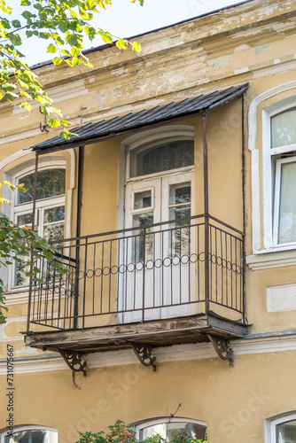 Wallpaper Mural balcony with decorative elements on an old brick building Torontodigital.ca