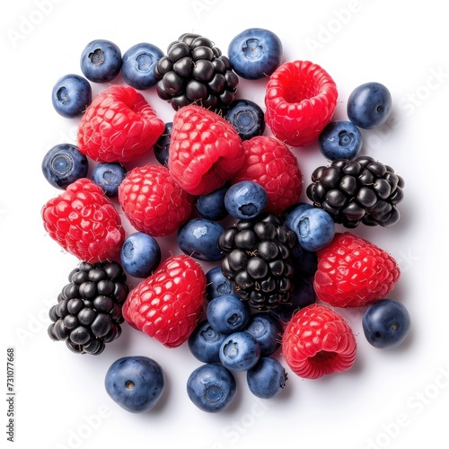 Pile of Berries and Raspberries on White Background