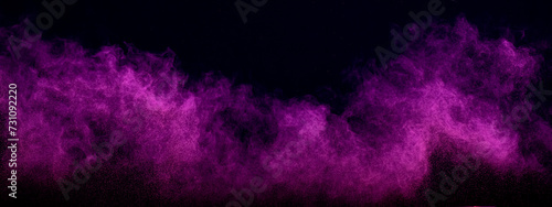 Purple powder dust smoke on black background