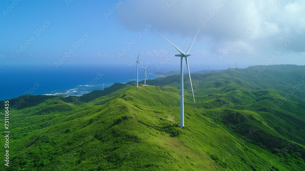 Wind turbines stand atop lush green hills with a panoramic view of the coast and sea Wind turbines stand atop lush green hills with a panoramic view of the coast and sea