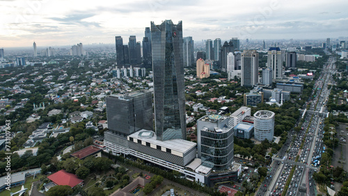Panoramic cityscape of Indonesia capital city Jakarta at sunset. A rare clear day in the polluted city.