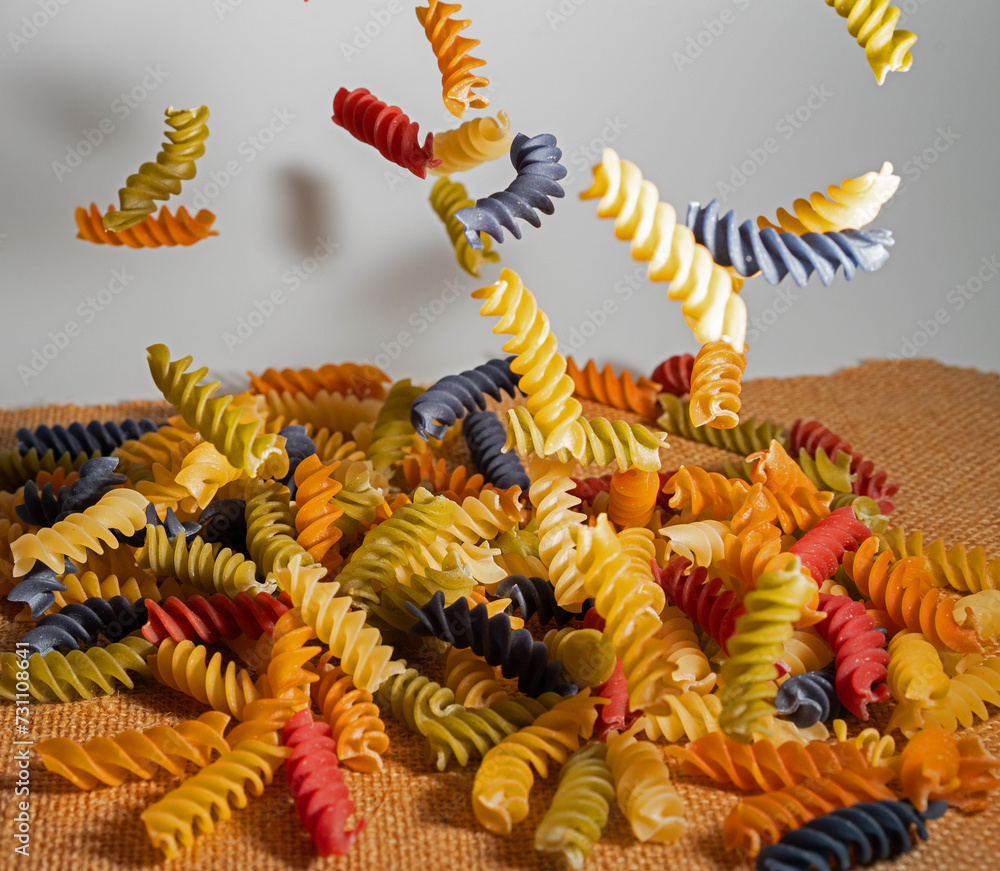 spiral pasta falling or levitate in kitchen