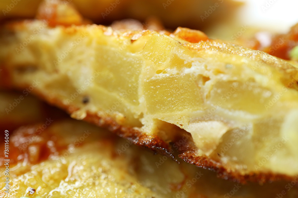 Closeup of Mouthwatering Spanish Omelet or Tortilla de Patatas Closeup of Mouthwatering Spanish Omelet or Tortilla de Patatas