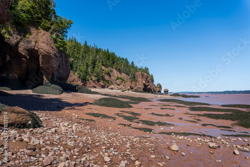 Hopewell Rocks Provincial Park in New Brunswick, Canada. Also called Flowerpots Rocks or simply the Rocks, are rock formations or sea stacks caused by tidal erosion.