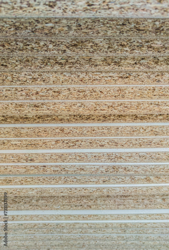 Veneer particle boards pilled on high. Edge details Veneer particle boards pilled on high. Edge details
