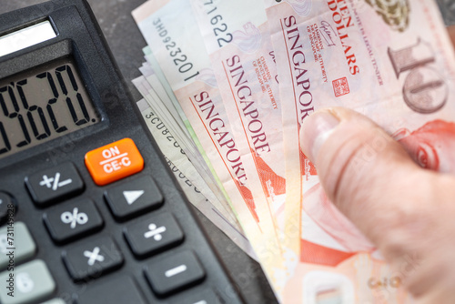 Photography Singapore dollar, financial settlements, household budget, taxes, Singapore curr