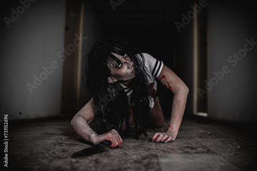 Portrait of asian woman make up ghost,Scary horror scene for background,Halloween festival concept,Ghost movies poster,angry spirit in the apartment