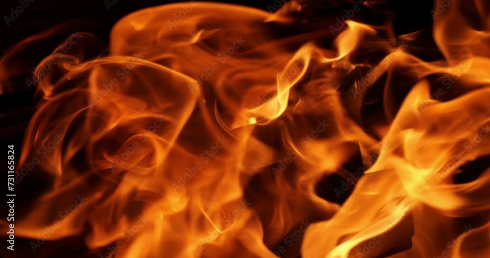 Flames of fire flicker on a black background. Fire hazard. Testura fire. Flames of fire flicker on a black background. Fire hazard. Testura fire.
