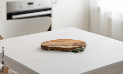 Wooden tabletop with cutting board for product montage or mockup