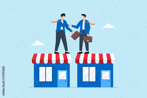 Businessman owner handshake on company shop for B2B agreement