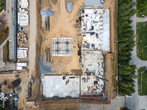 Photography the construction site of an apartment building in the summer from a height