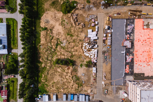 Photography the construction site of an apartment building in the summer from a height