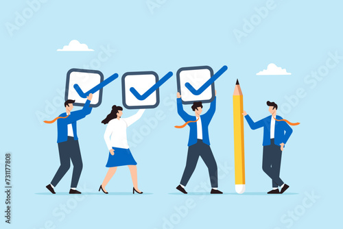 Business people holding checklist and pencil to tick