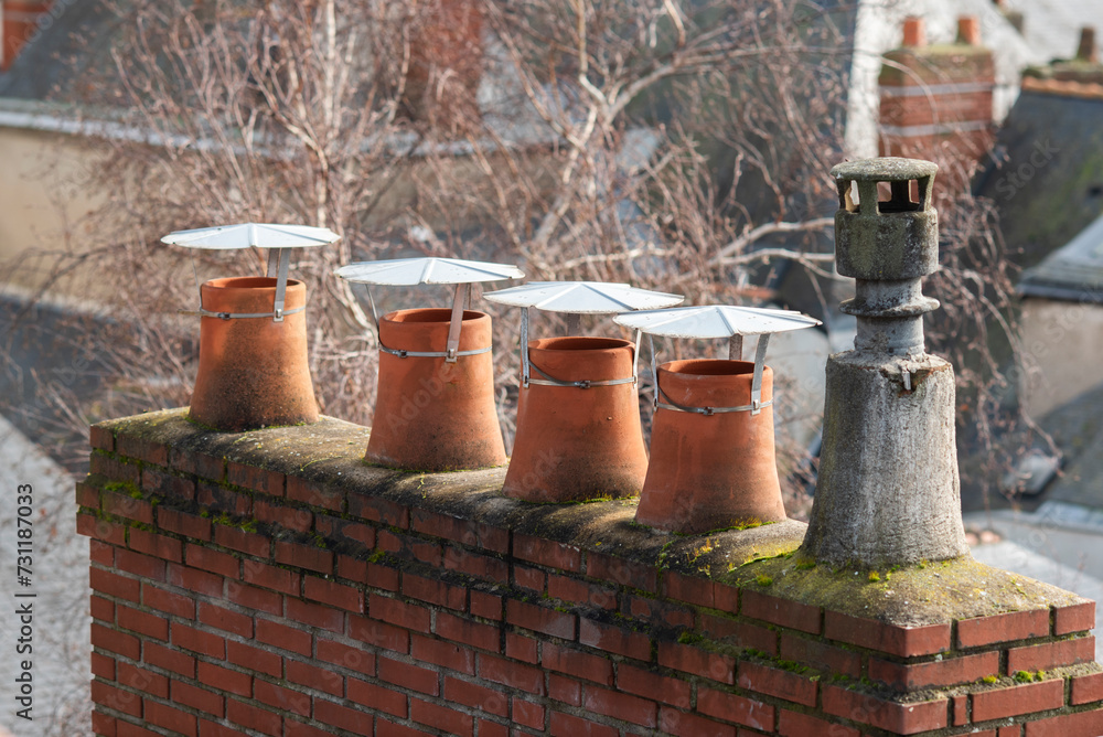 Old chimney on a tenement house in France. Old chimney on a tenement house in France.