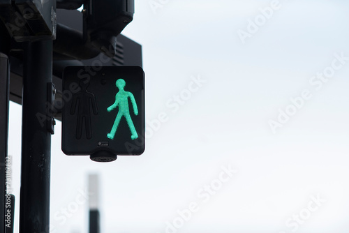 Green light at pedestrian traffic lights.