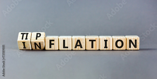 Inflation or tipflation symbol. Concept words Inflation Tipflation on beautiful wooden blocks. Beautiful grey table grey background. Business inflation Tipflation concept. Copy space photo