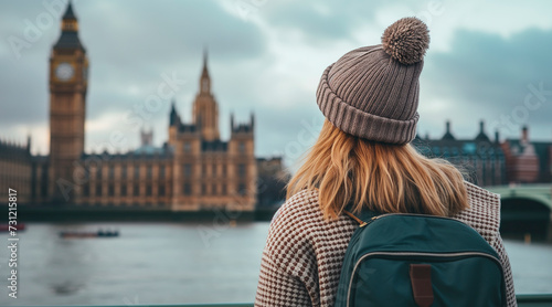 A female travelling looking Big Ben and The Houses of Parliament in London photo