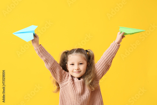 Cute little girl with paper...