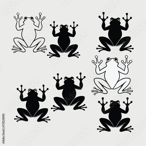 Black and white frog silhouettes arranged in a pattern against a gray background. photo