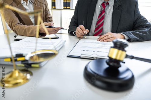 Good service cooperation, Consultation of Businesswoman and Male lawyer or judge counselor having team meeting with client, Law and Legal services concept photo