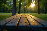 Wooden table in an evening park A serene and atmospheric setting A tranquil scene of nature and relaxation