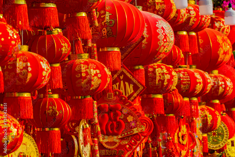 Naklejka premium The fair before the Lunar New Year. The Eastern New Year according to the lunar calendar. Sale of attributes and jewelry in Nha Trang in Vietnam.