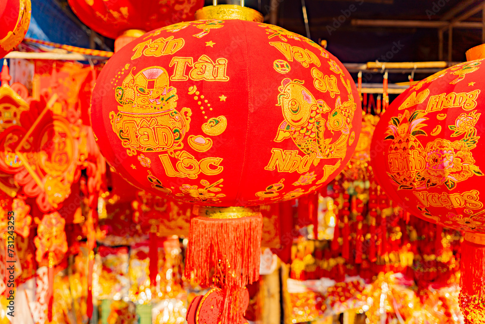 Naklejka premium The fair before the Lunar New Year. The Eastern New Year according to the lunar calendar. Sale of attributes and jewelry in Nha Trang in Vietnam.